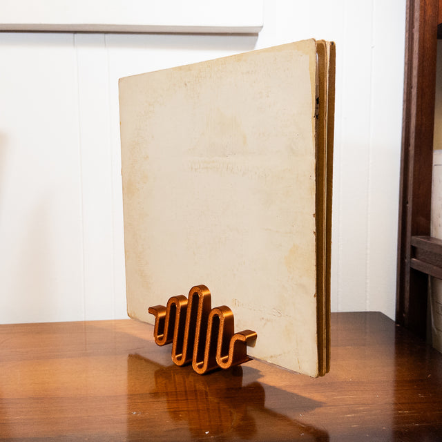 a wooden table with a book on it
