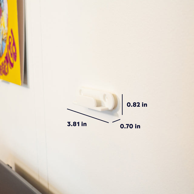 a white wall with a white handle on it