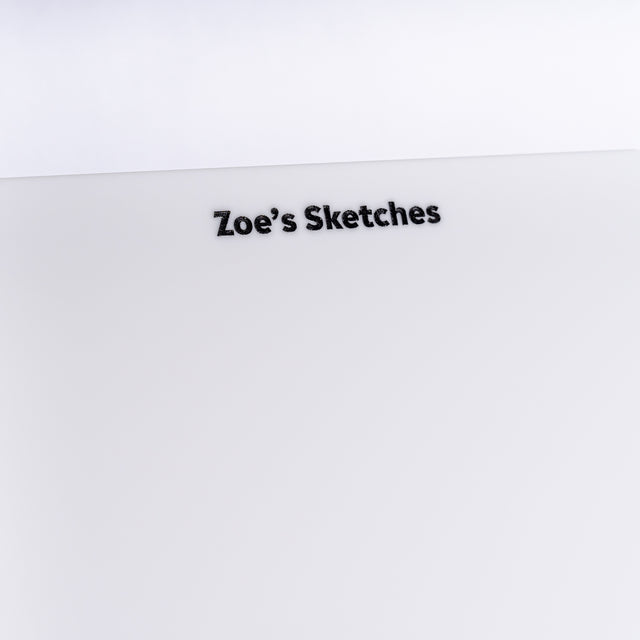 a white wall with a sign that says zoo's sketches