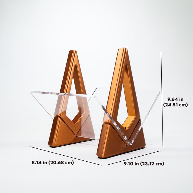 a pair of triangular shaped glass and metal objects