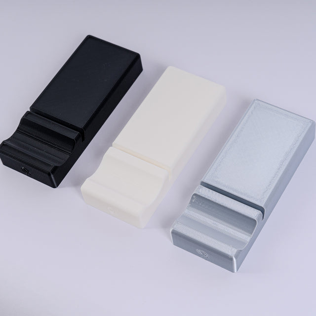 three different types of soap on a white surface