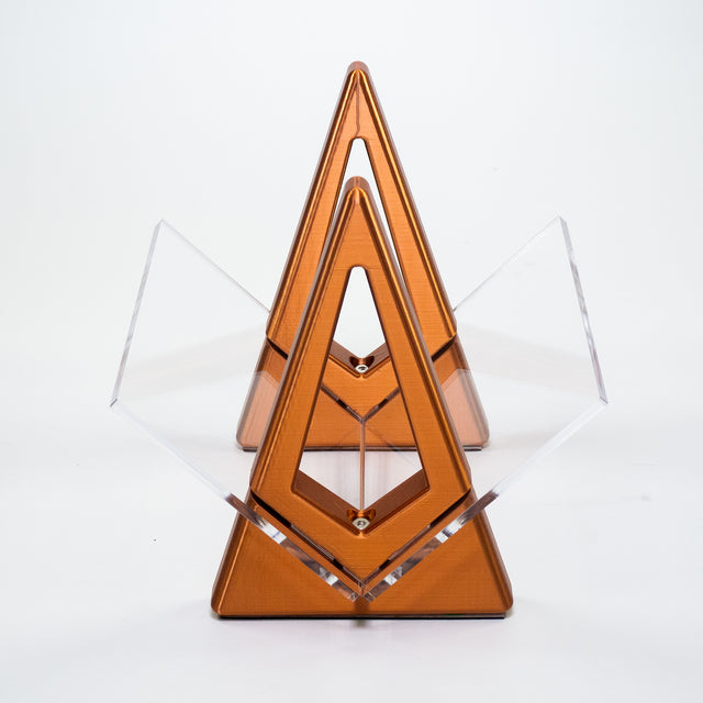 a wooden sculpture with a triangle on top of it