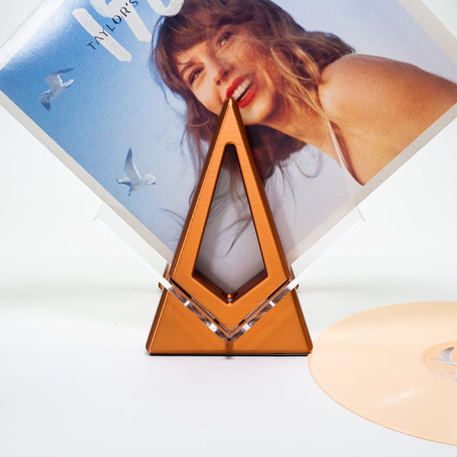 a picture of a woman on a cd stand